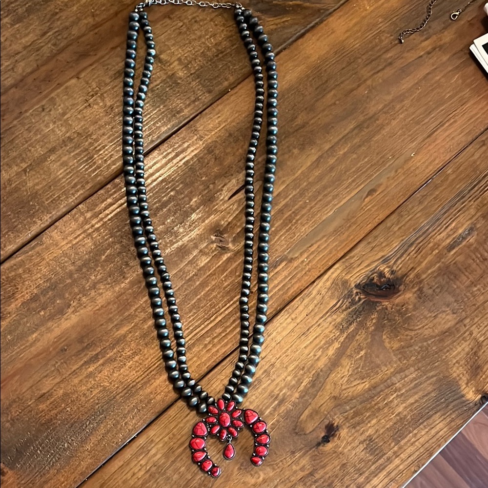 Faux Navajo pearl and red squash blossom